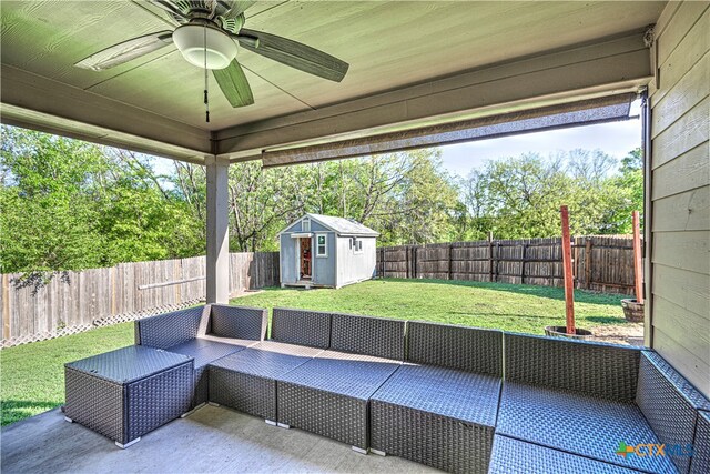 unfurnished sunroom with ceiling fan