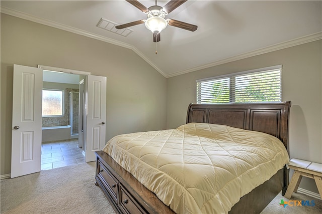 carpeted bedroom with ceiling fan, multiple windows, lofted ceiling, and ornamental molding