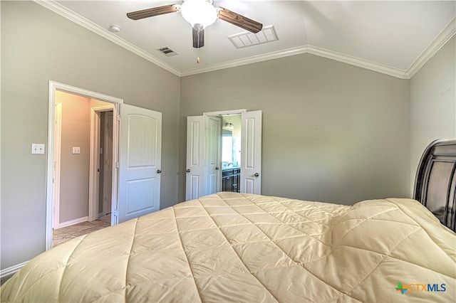 bedroom with ornamental molding, lofted ceiling, and ceiling fan