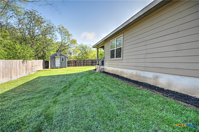 view of yard with a storage shed