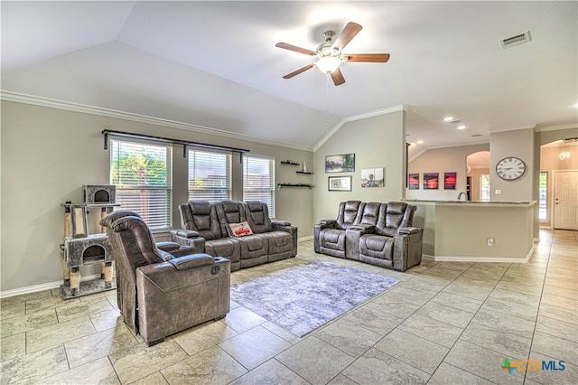 living room featuring lofted ceiling, ceiling fan, and crown molding