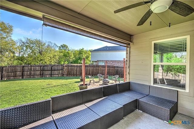 view of patio featuring ceiling fan and an outdoor living space