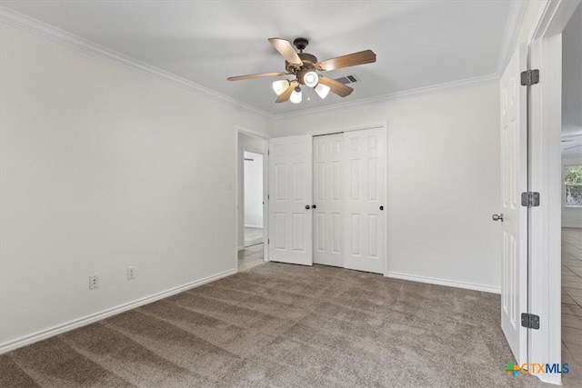 7778 Little Deer Trl, Georgetown, TX 78628 - unfurnished bedroom featuring ornamental molding, carpet, baseboards, and visible vents