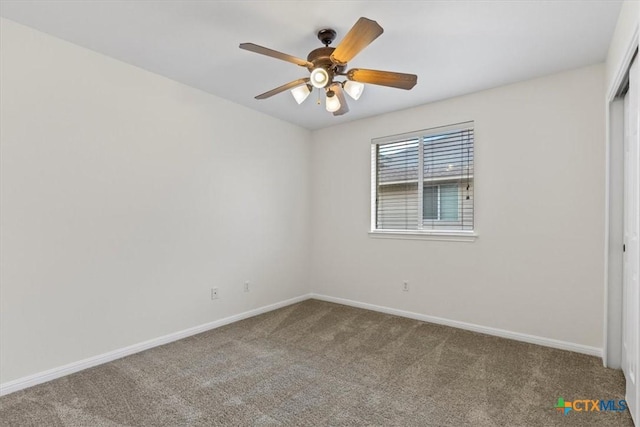 7778 Little Deer Trl, Georgetown, TX 78628 - unfurnished bedroom with carpet flooring, a closet, baseboards, and a ceiling fan
