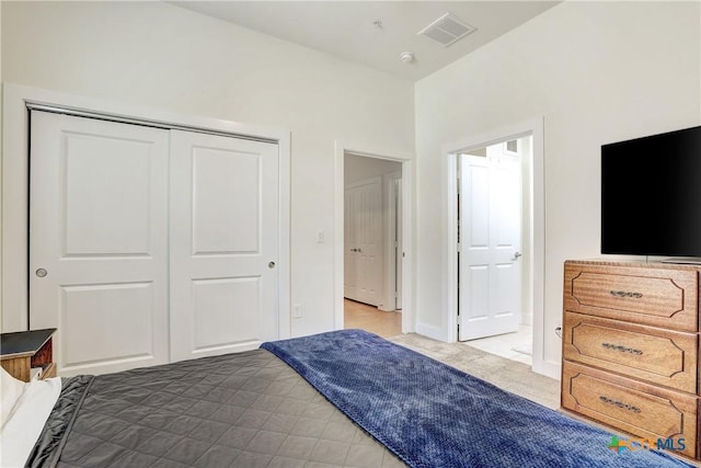 2400 Louis Henna Blvd Unit 305, Round Rock, TX 78664 - carpeted bedroom with visible vents and a closet