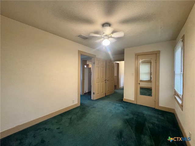 503 Dunn St, Yoakum, TX 77995 - interior space featuring baseboards, visible vents, and a textured ceiling