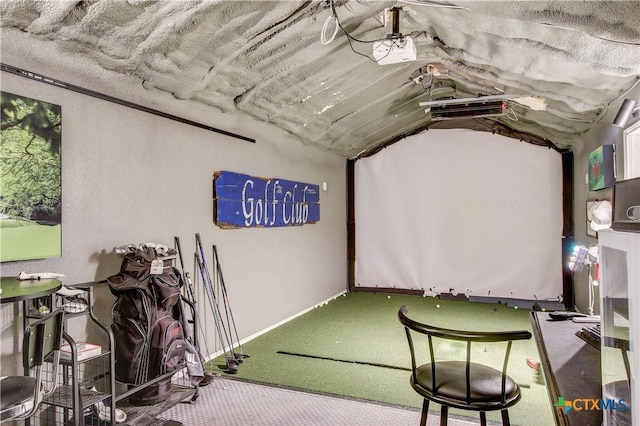 rec room featuring lofted ceiling and carpet floors