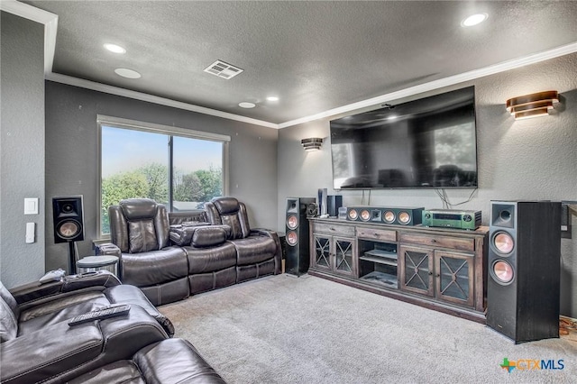 carpeted living area with a textured wall, visible vents, and crown molding