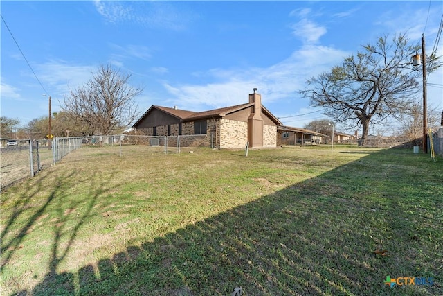 view of yard with fence