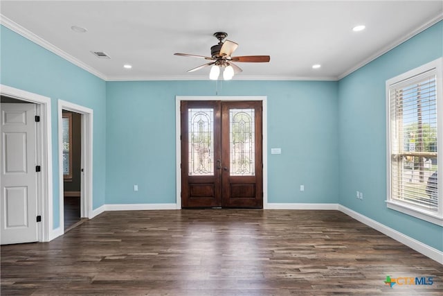 2212 Clay Ave, Waco, TX 76706 - entrance foyer with french doors, ceiling fan, wood finished floors, baseboards, and crown molding