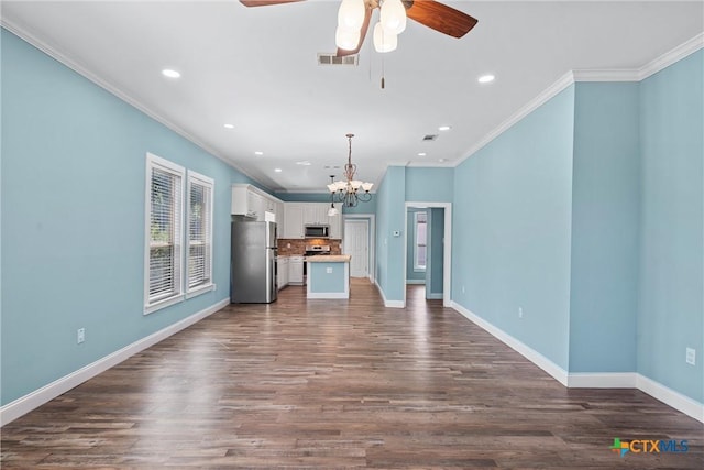 2212 Clay Ave, Waco, TX 76706 - unfurnished living room with crown molding, a chandelier, baseboards, ceiling fan, and dark wood-style floors