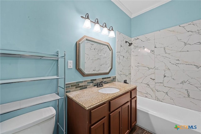 2212 Clay Ave, Waco, TX 76706 - full bathroom featuring toilet, ornamental molding, vanity, tasteful backsplash, and shower / washtub combination