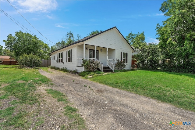 2212 Clay Ave, Waco, TX 76706 - view of front facade featuring covered porch and dirt driveway