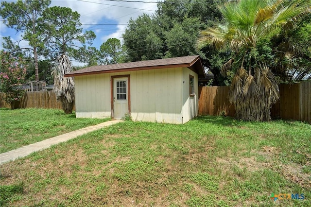 1705 Neuman St, Gonzales, TX 78629 - view of shed featuring a fenced backyard