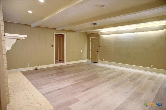 1705 Neuman St, Gonzales, TX 78629 - unfurnished room with beamed ceiling, light wood finished floors, and recessed lighting