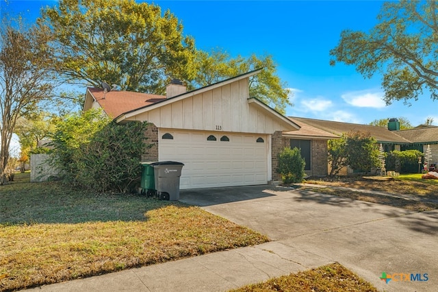 ranch-style house with a front yard and a garage