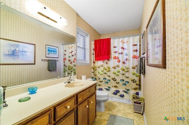 full bathroom featuring a textured ceiling, vanity, shower / bath combo with shower curtain, tile patterned flooring, and toilet