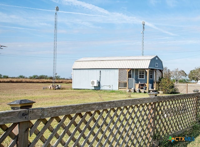 view of outdoor structure featuring an outdoor structure and fence