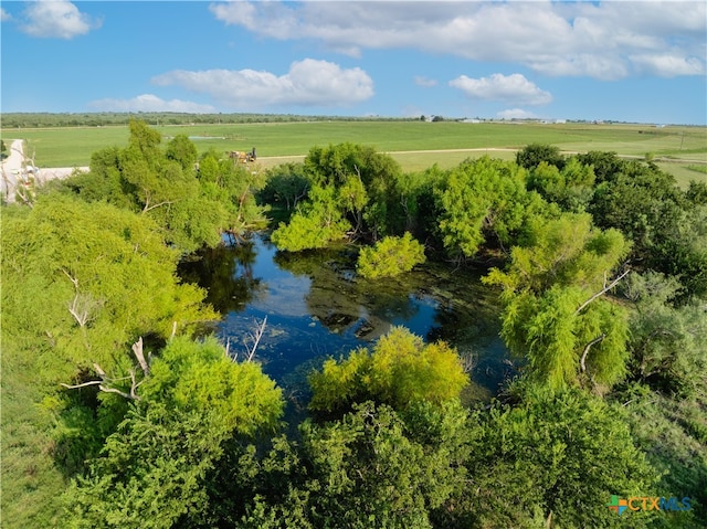 birds eye view of property featuring a rural view