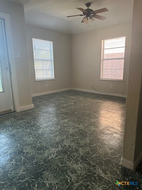 empty room with ceiling fan