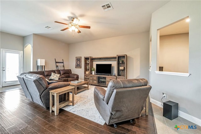 822 Old World Dr, Harker Heights, TX 76548 - living area with a ceiling fan, wood finished floors, and arched walkways
