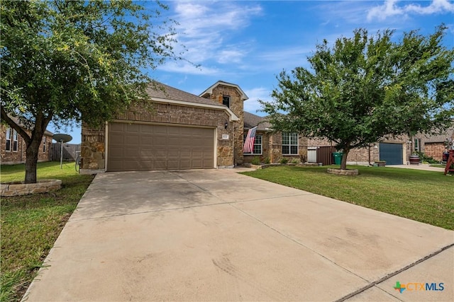 822 Old World Dr, Harker Heights, TX 76548 - view of front facade featuring a front lawn, a garage, stone siding, and driveway