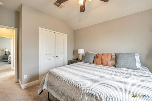 822 Old World Dr, Harker Heights, TX 76548 - bedroom featuring light colored carpet, a closet, lofted ceiling, and a ceiling fan