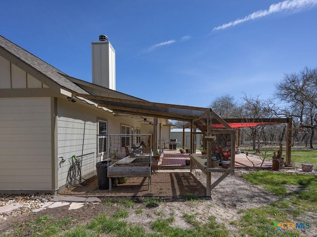 view of patio featuring a ceiling fan