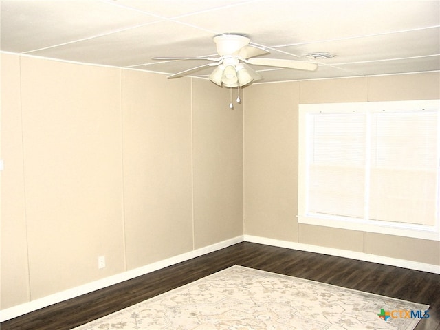 unfurnished room featuring hardwood / wood-style floors and ceiling fan