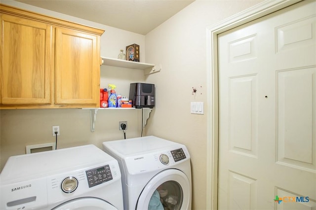 2406 Peace Pipe Cir, Copperas Cove, TX 76522 - washroom featuring washing machine and clothes dryer and cabinet space