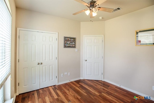 2406 Peace Pipe Cir, Copperas Cove, TX 76522 - unfurnished bedroom with wood finished floors, baseboards, a closet, and a ceiling fan