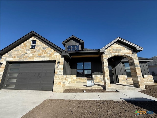 view of front of property with a garage