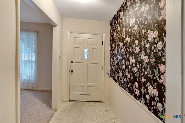 304 Simpson Rd, Victoria, TX 77904 - foyer entrance with baseboards and tile patterned floors