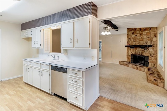 304 Simpson Rd, Victoria, TX 77904 - kitchen featuring dishwasher, ceiling fan, open floor plan, white cabinetry, and beamed ceiling