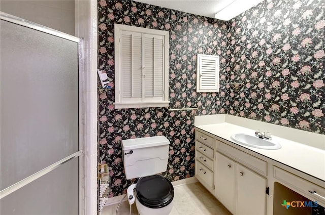 304 Simpson Rd, Victoria, TX 77904 - full bathroom with wallpapered walls, a stall shower, and vanity