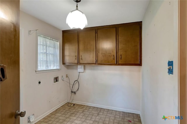 304 Simpson Rd, Victoria, TX 77904 - laundry area featuring hookup for a washing machine, cabinet space, electric dryer hookup, and light flooring