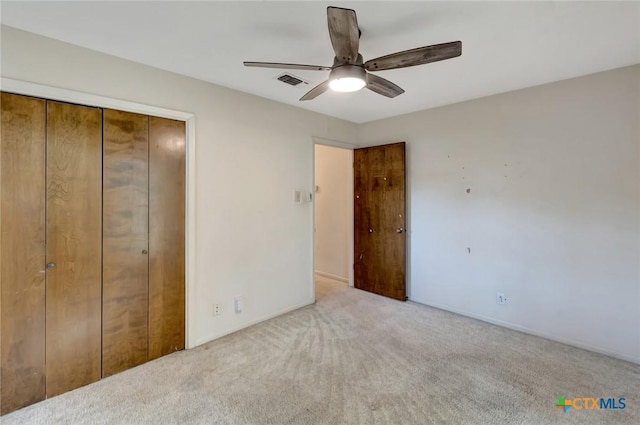 304 Simpson Rd, Victoria, TX 77904 - unfurnished bedroom featuring carpet floors, a closet, and a ceiling fan