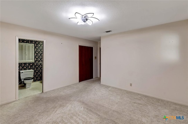 304 Simpson Rd, Victoria, TX 77904 - empty room featuring light carpet