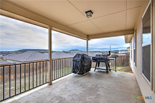 view of patio with a residential view and grilling area