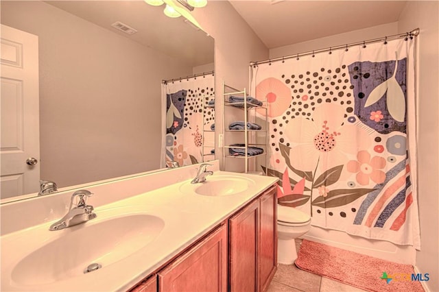 full bath with toilet, tile patterned flooring, a sink, and visible vents