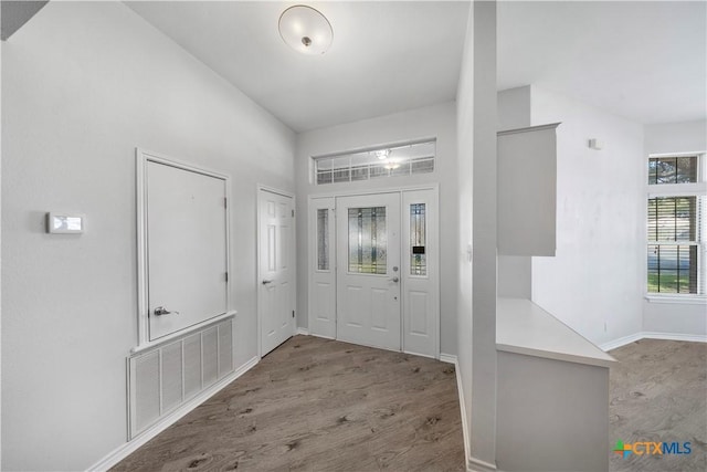 foyer entrance featuring light hardwood / wood-style flooring