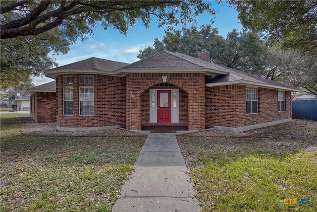 view of front of house with a front lawn