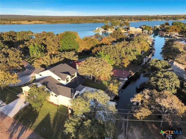 bird's eye view with a water view