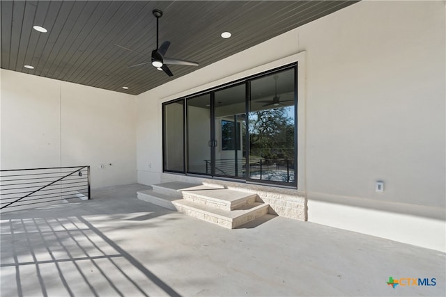 view of patio with ceiling fan