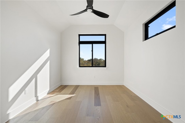 bonus room featuring light hardwood / wood-style floors, vaulted ceiling, and ceiling fan