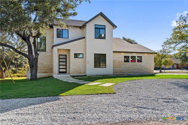 view of front of property with a front yard