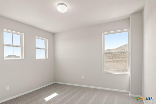 192 Lavender Ln, Elgin, TX 78621 - unfurnished room featuring baseboards and light colored carpet