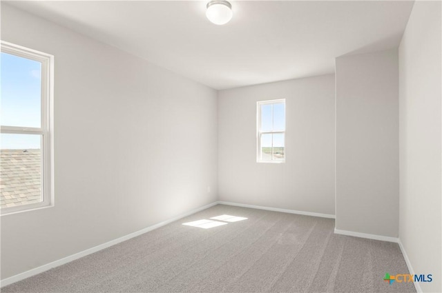 192 Lavender Ln, Elgin, TX 78621 - unfurnished room featuring baseboards and carpet flooring