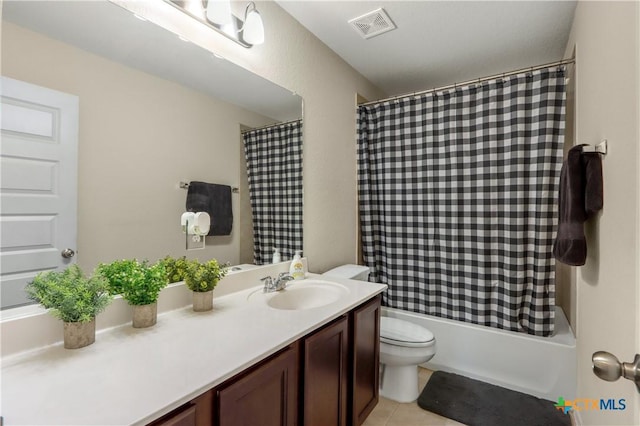 full bathroom with toilet, tile patterned flooring, vanity, and shower / tub combo with curtain