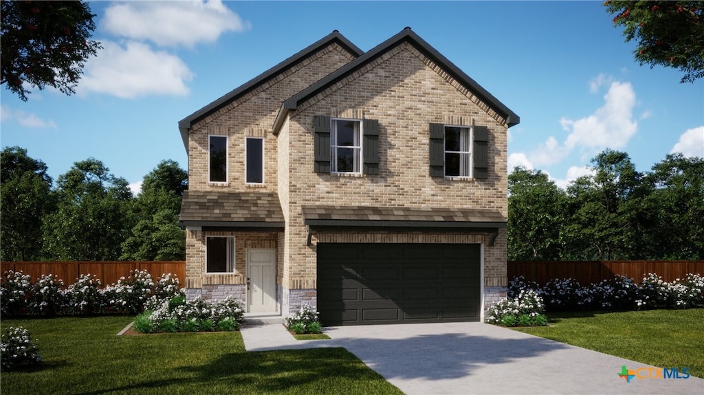 view of front of home featuring a garage and a front lawn